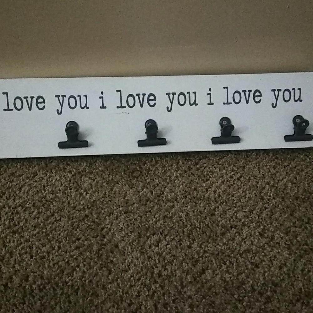 A photo holder. Wall art.
